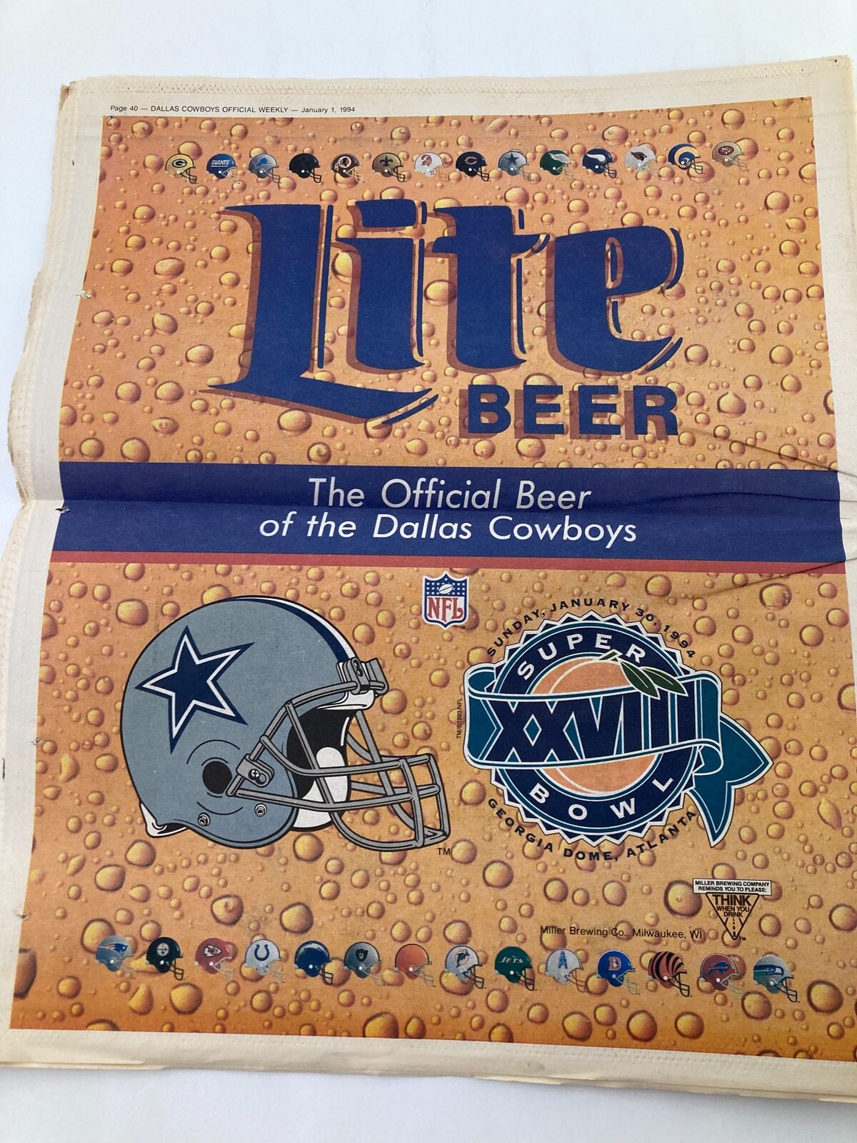 Dallas Cowboys Weekly Newspaper January 1 1994 Vol 19 #28 showcasing an advertisement for Lite Beer as the official beer of the Dallas Cowboys, emphasizing NFL branding and Super Bowl XXVIII.