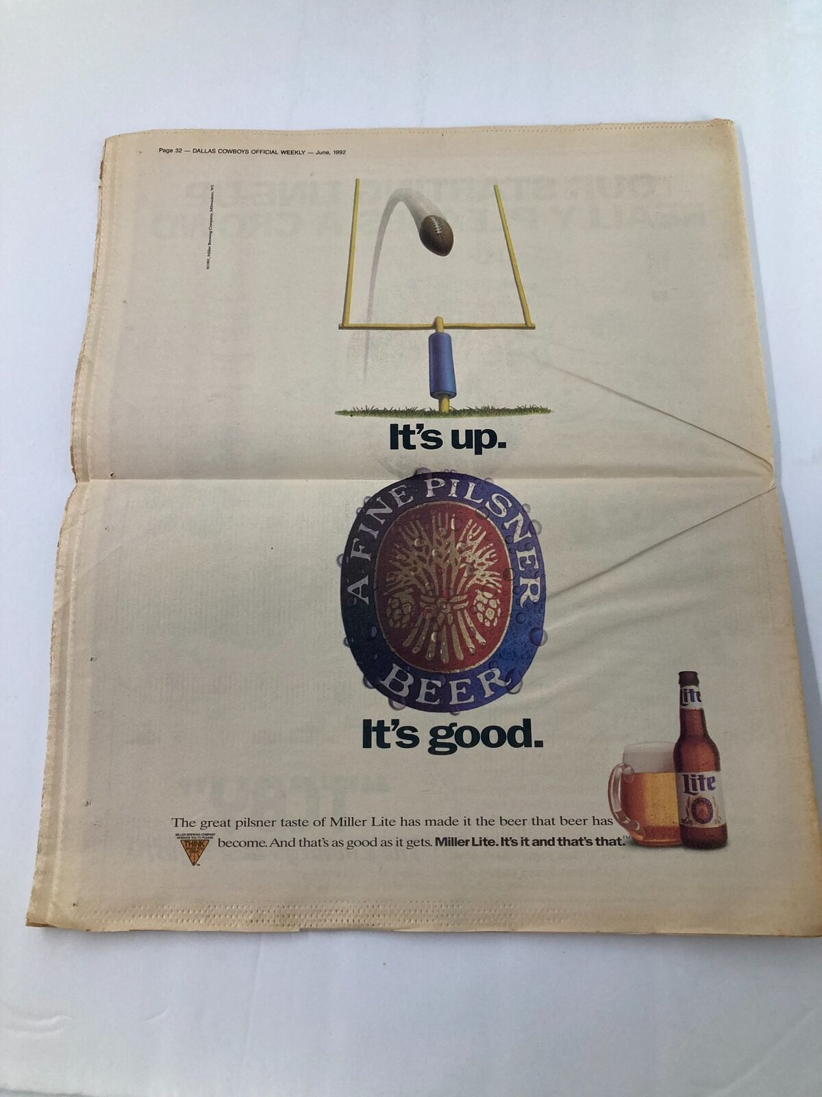 Dallas Cowboys Weekly Newspaper June 1992 Vol 18 #5 featuring an advertisement for Miller Lite beer with the caption 'It's up' and 'It's good.' The newspaper shows minor wear and is folded, includes a protective covering.