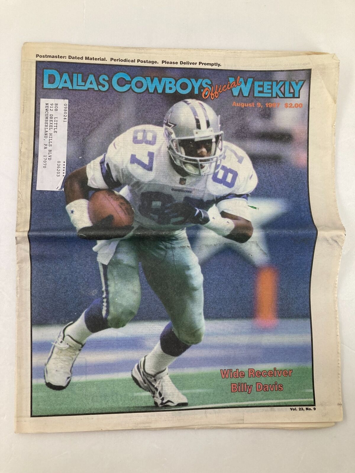 Cover of the Dallas Cowboys Weekly Newspaper August 9 1997 Vol 23 #9 featuring wide receiver Billy Davis in action.