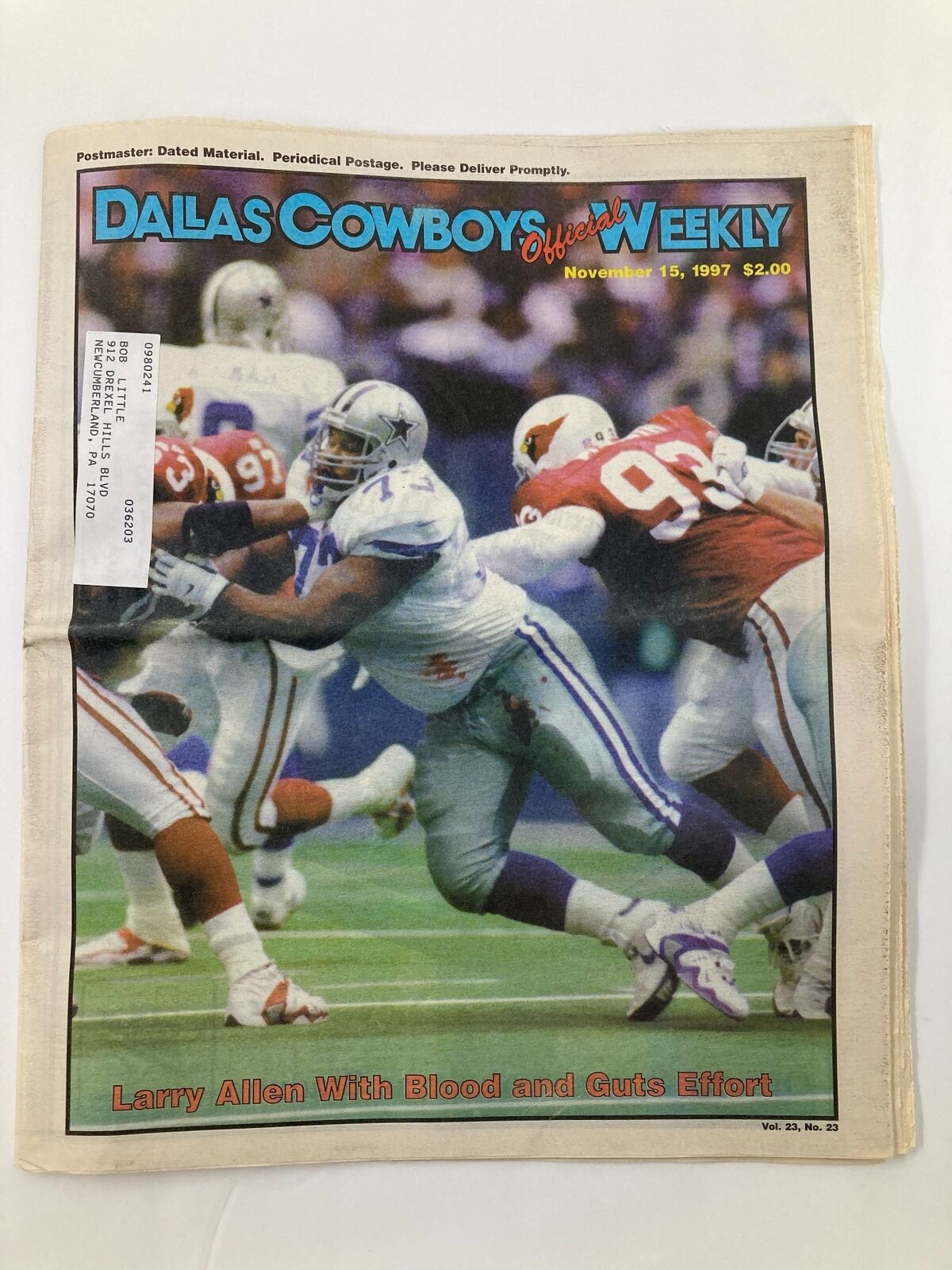 Cover of Dallas Cowboys Weekly Newspaper dated November 15, 1997, featuring Larry Allen and a dynamic football scene.