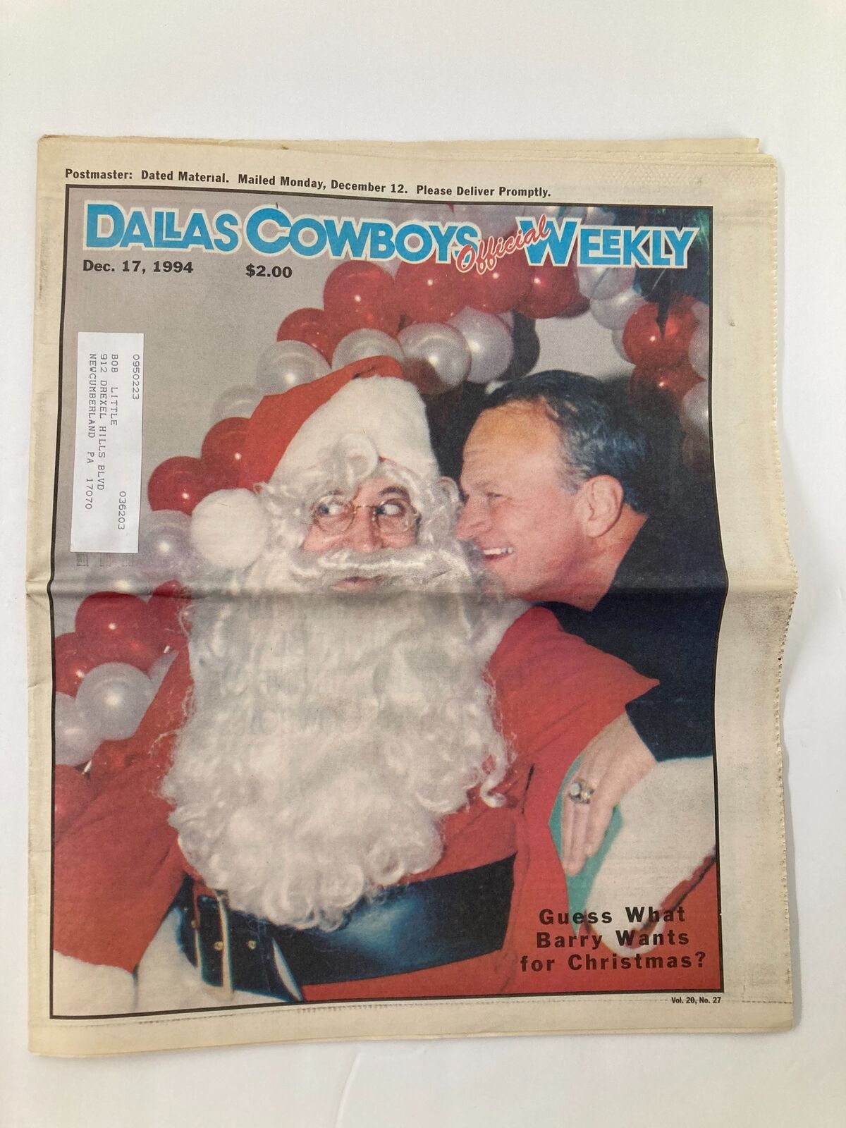 Dallas Cowboys Weekly Newspaper cover from December 17, 1994, featuring Santa Claus and Barry Switzer with a festive background, highlighting the question 'Guess What Barry Wants for Christmas?'.