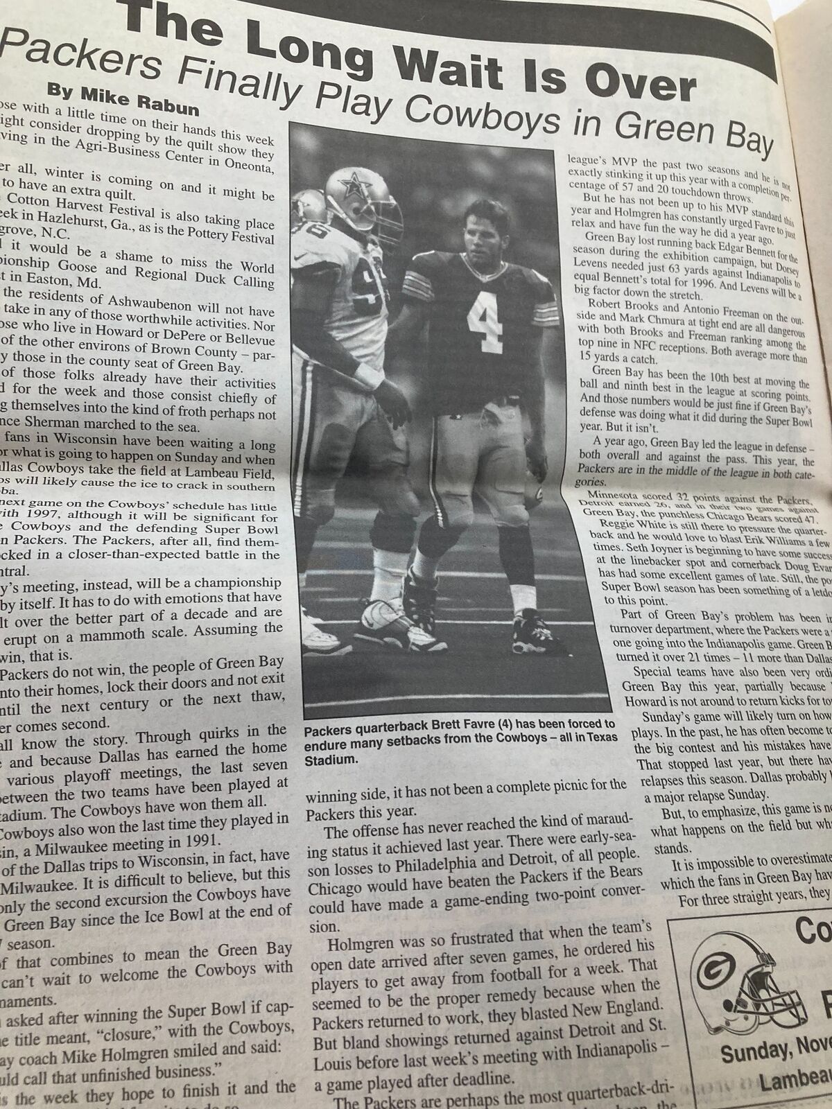 Interior page of the Dallas Cowboys Weekly Newspaper from November 22, 1997, titled 'The Long Wait Is Over', detailing a game between the Dallas Cowboys and Green Bay.