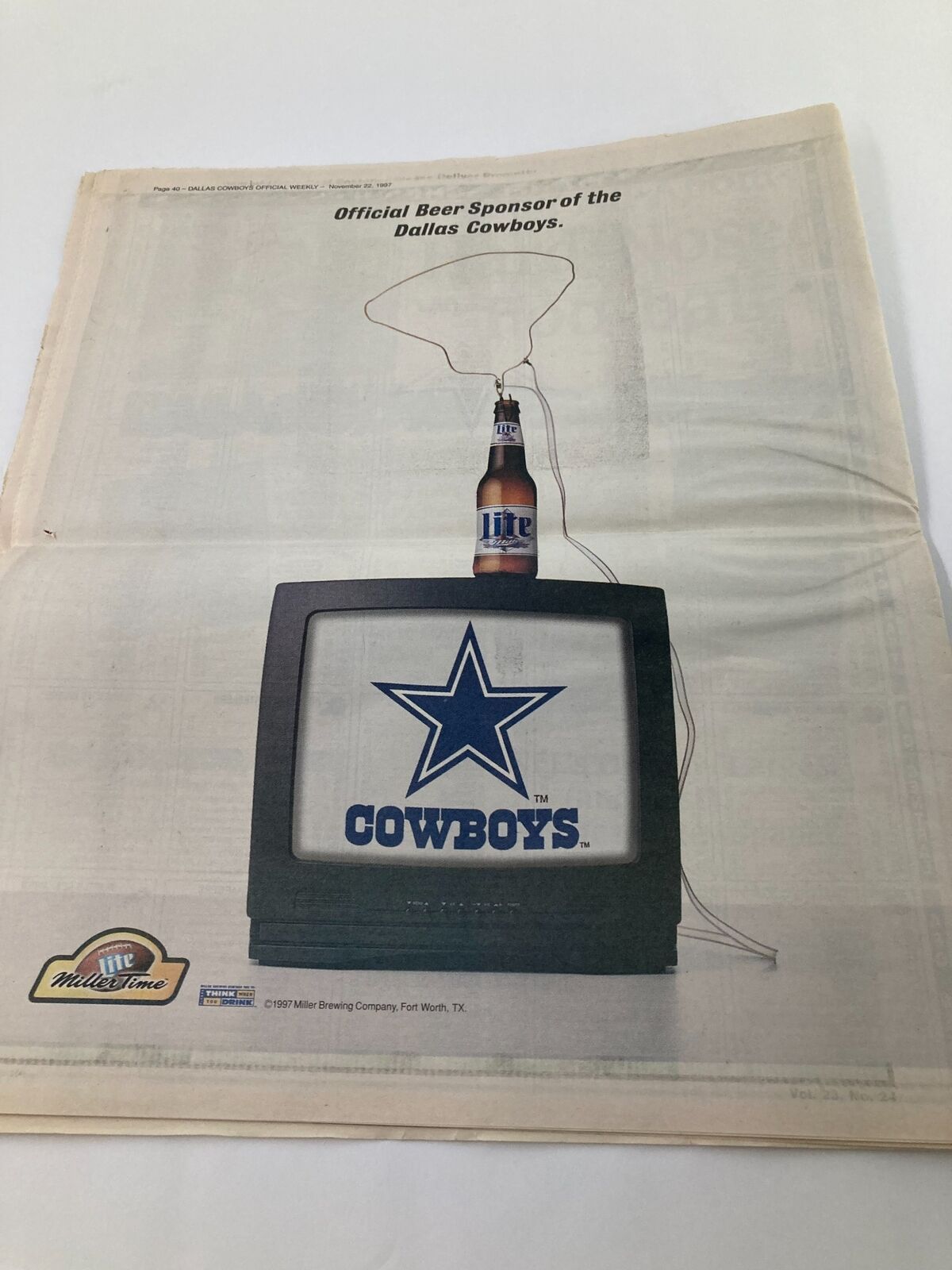 Dallas Cowboys Weekly Newspaper November 22 1997 Vol 23 #24 featuring a vintage advertisement for the official beer sponsor, Miller Lite, on a TV showcasing the Cowboys logo.
