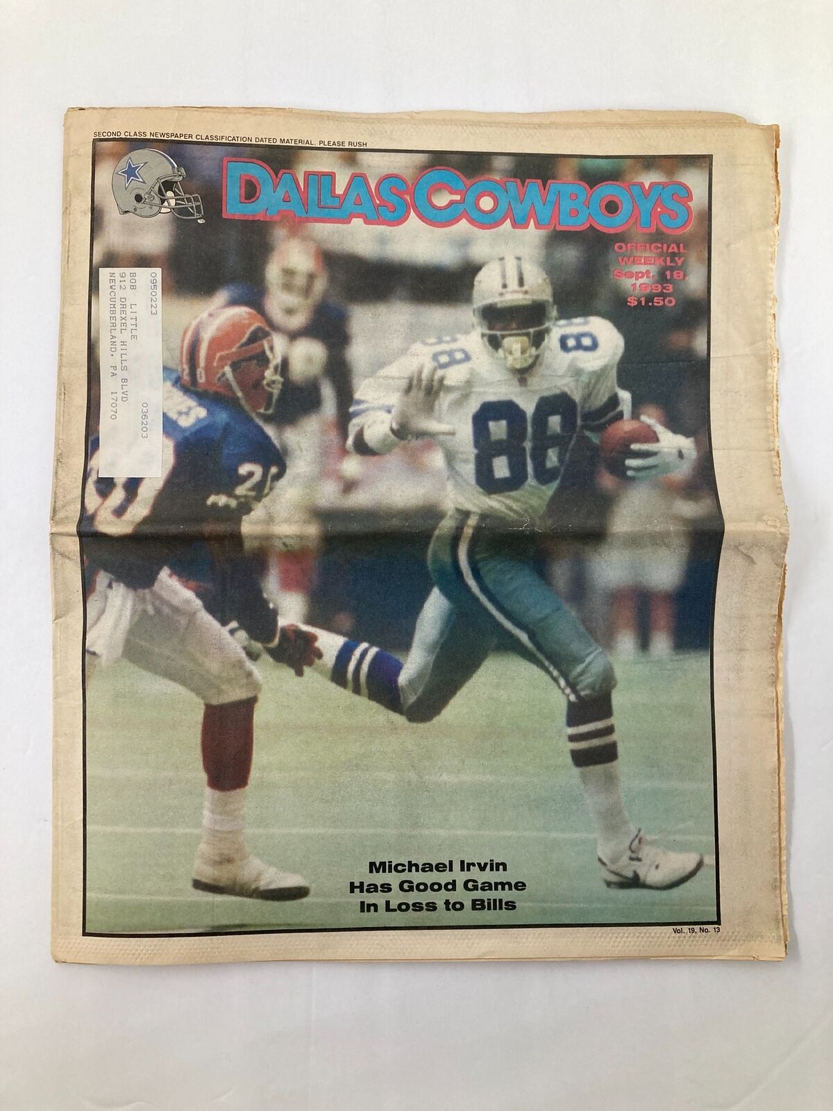 Dallas Cowboys Weekly Newspaper September 18 1993 Vol 19 #13 featuring Michael Irvin running the football against opposing players, showcasing his performance in a game against the Bills.