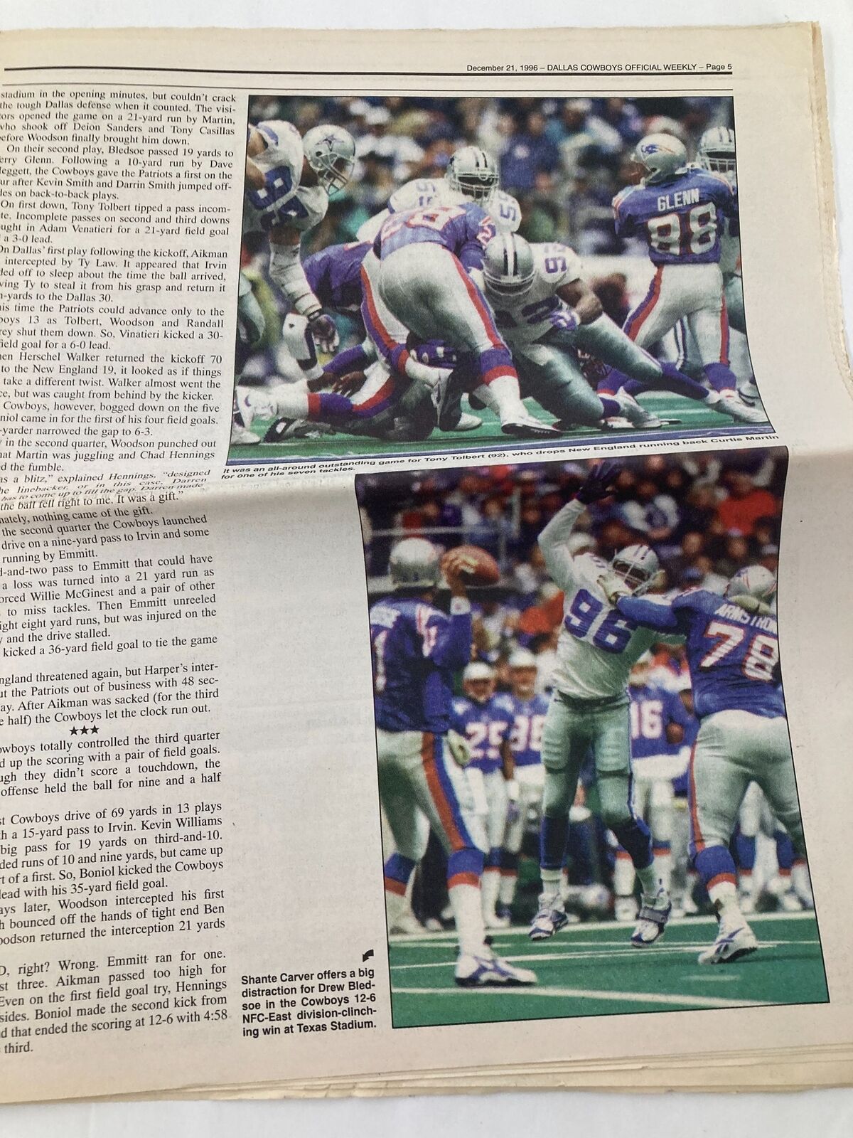 Dallas Cowboys Weekly Newspaper December 21 1996 Vol 22 #28 showcasing two action shots from the Cowboys game, featuring key players during a tense moment.