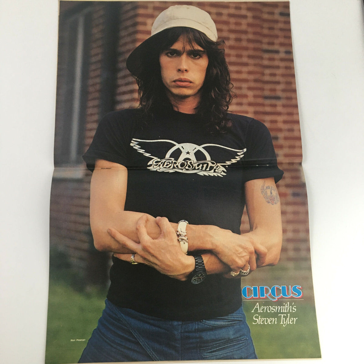 Poster featuring Steven Tyler from Circus Magazine March 16 1978, showcasing the Aerosmith frontman in a stylish outfit, capturing the essence of 1970s rock culture.