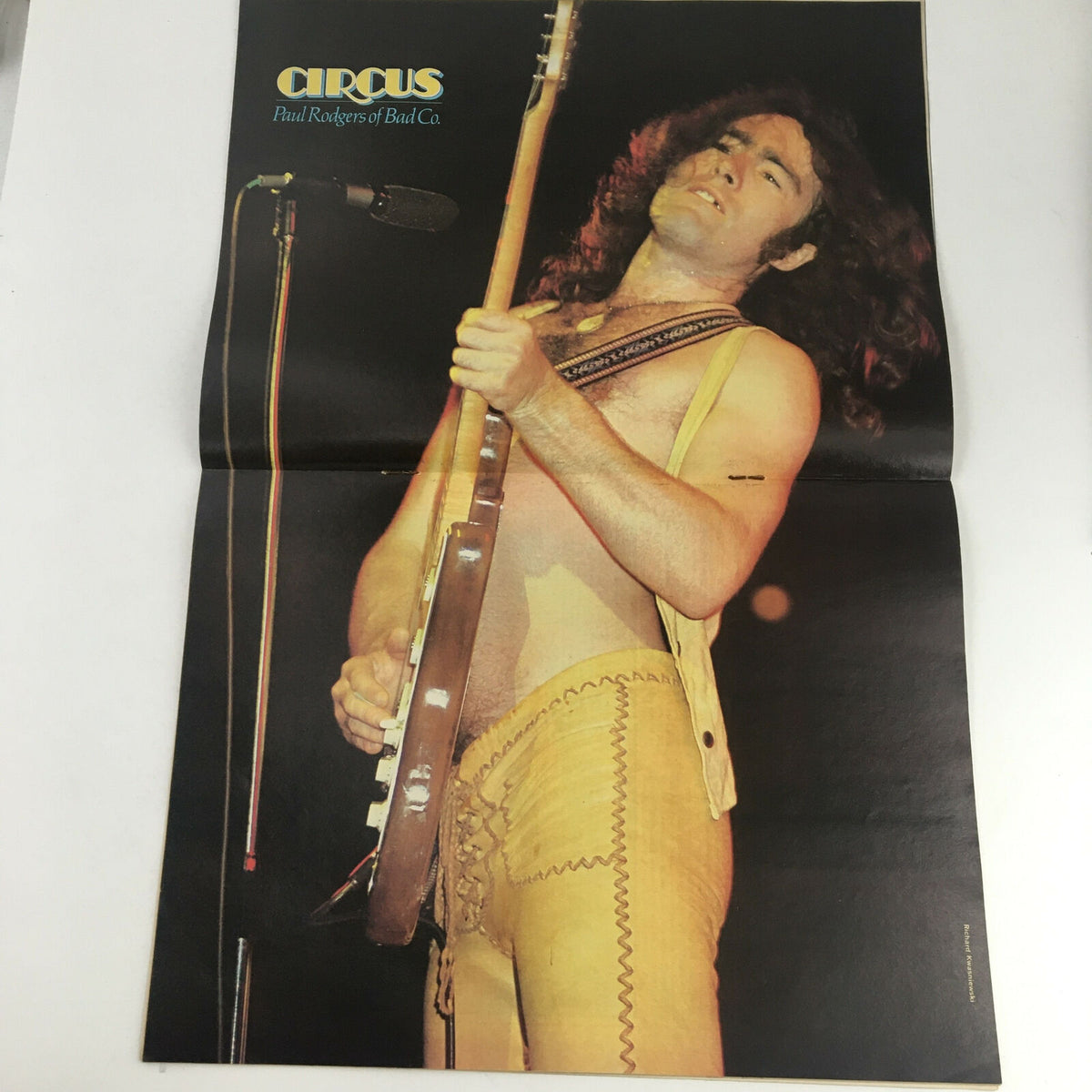 Poster of Paul Rodgers performing, featured in Circus Magazine March 17 1977 as part of Bad Company coverage, capturing the essence of rock music.