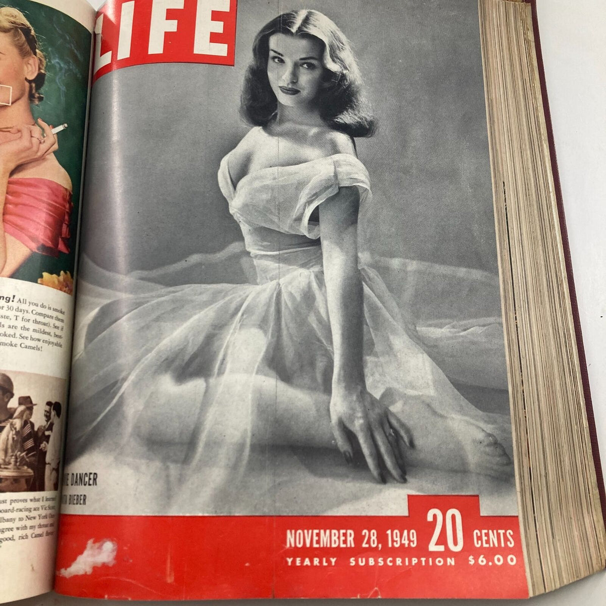 VTG 1949 Bound Life Magazine October - December Weekly Issue OPPENHEIMER featuring a model in a white dress on the cover dated November 28, 1949.