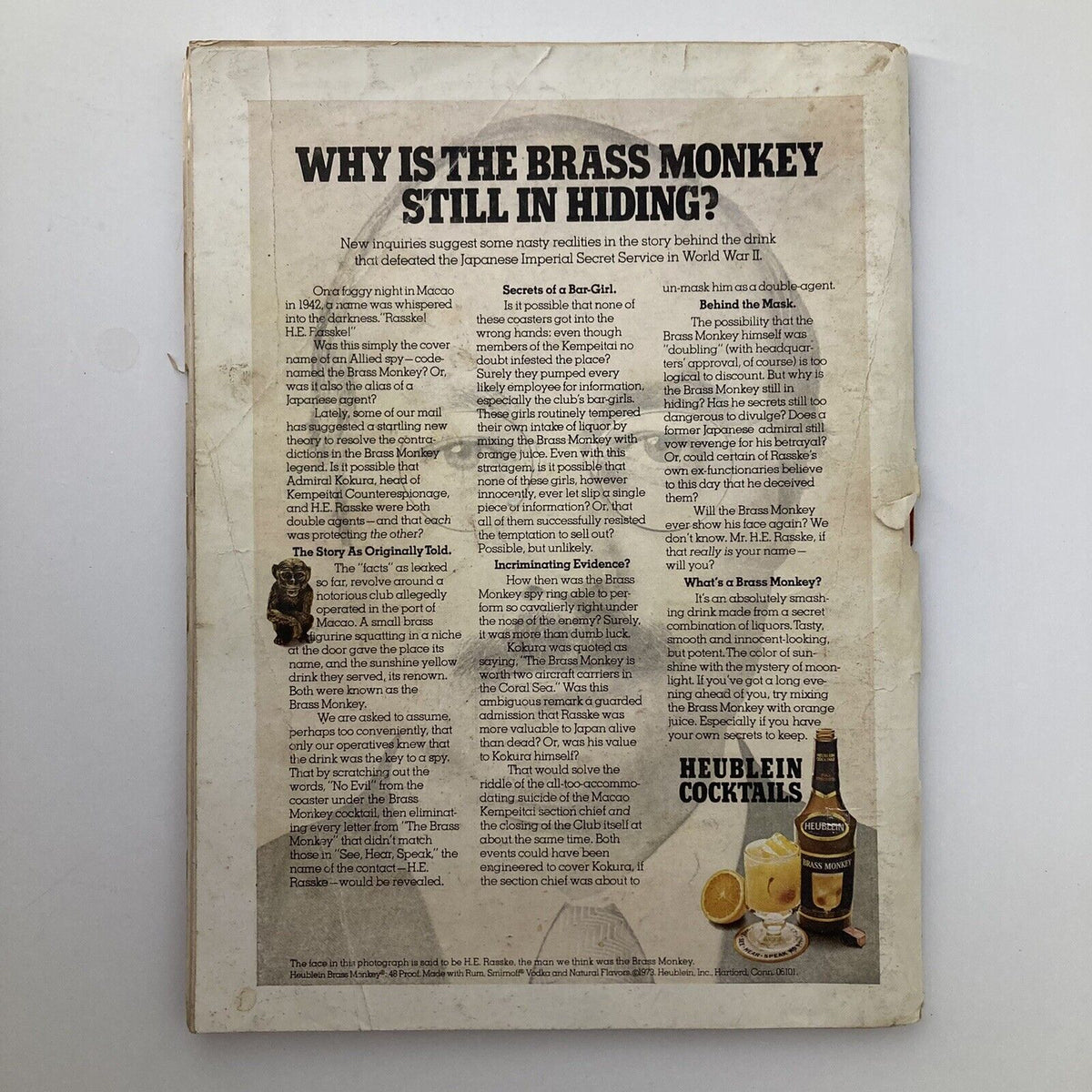 Back cover of the Vintage Playboy Magazine December 1973 featuring the article 'Why Is the Brass Monkey Still in Hiding?' along with a Heublein Cocktails advertisement.