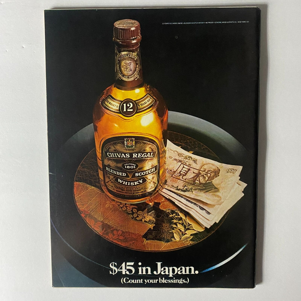 Advertisement page from Sports Illustrated Swimsuit Issue (February 14, 1983) featuring Chivas Regal blended scotch whisky and Japanese currency.