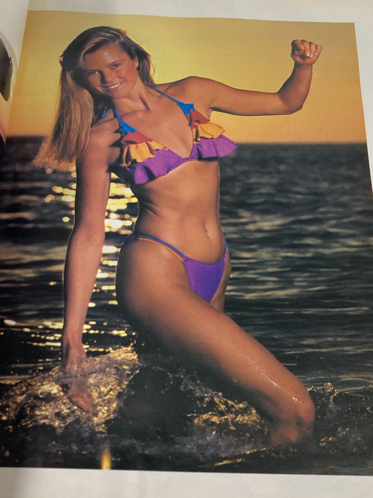 Christie Brinkley posing in a colorful bikini against a sunset backdrop featured in the Sports Illustrated magazine from February 9, 1981.