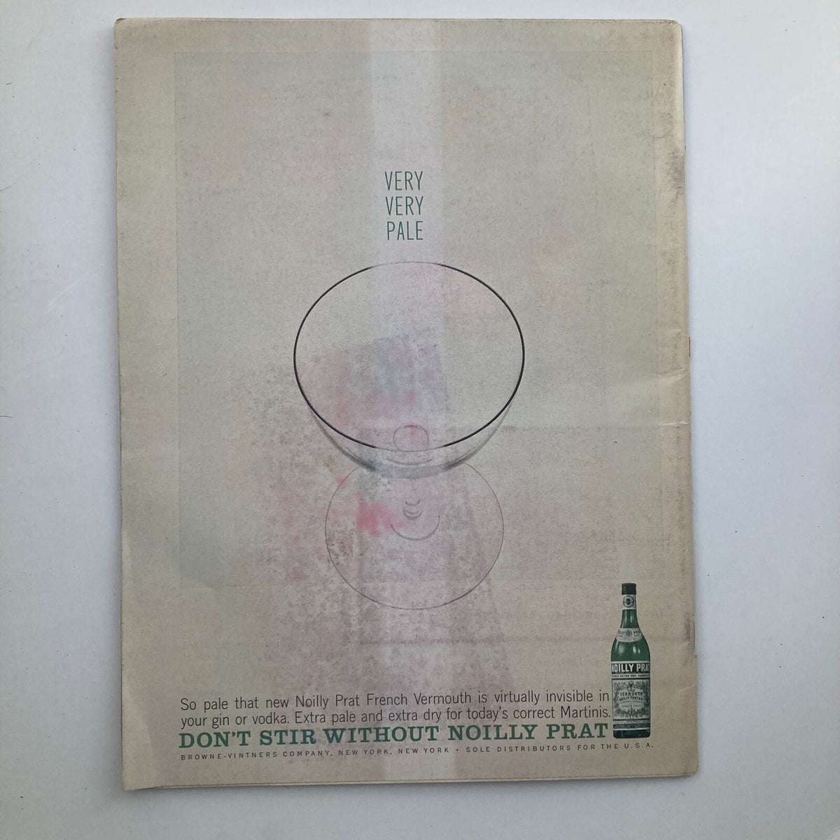 Back cover of Vintage Sports Illustrated Magazine October 28 1963 displaying an advertisement for Noilly Prat French Vermouth, emphasizing its unique qualities.