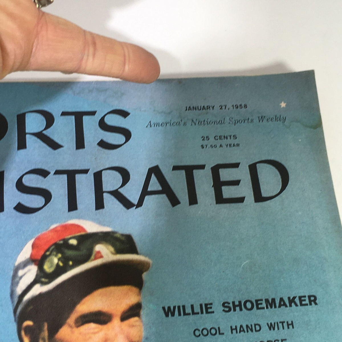 Close-up of the Sports Illustrated Magazine cover dated January 27, 1958, showcasing Willie Shoemaker, highlighting his legendary status in horse racing.