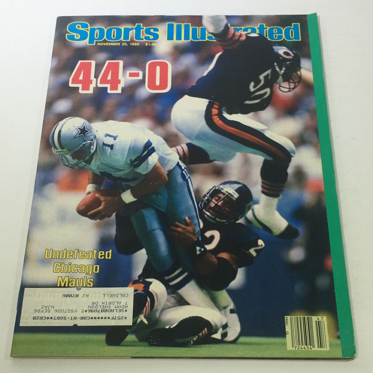 Sports Illustrated cover from November 25, 1985, featuring the title 'NFL Undefeated Chicago Mauls' and an image of a football player being tackled during a game, illustrating the Chicago Bears' 44-0 victory.