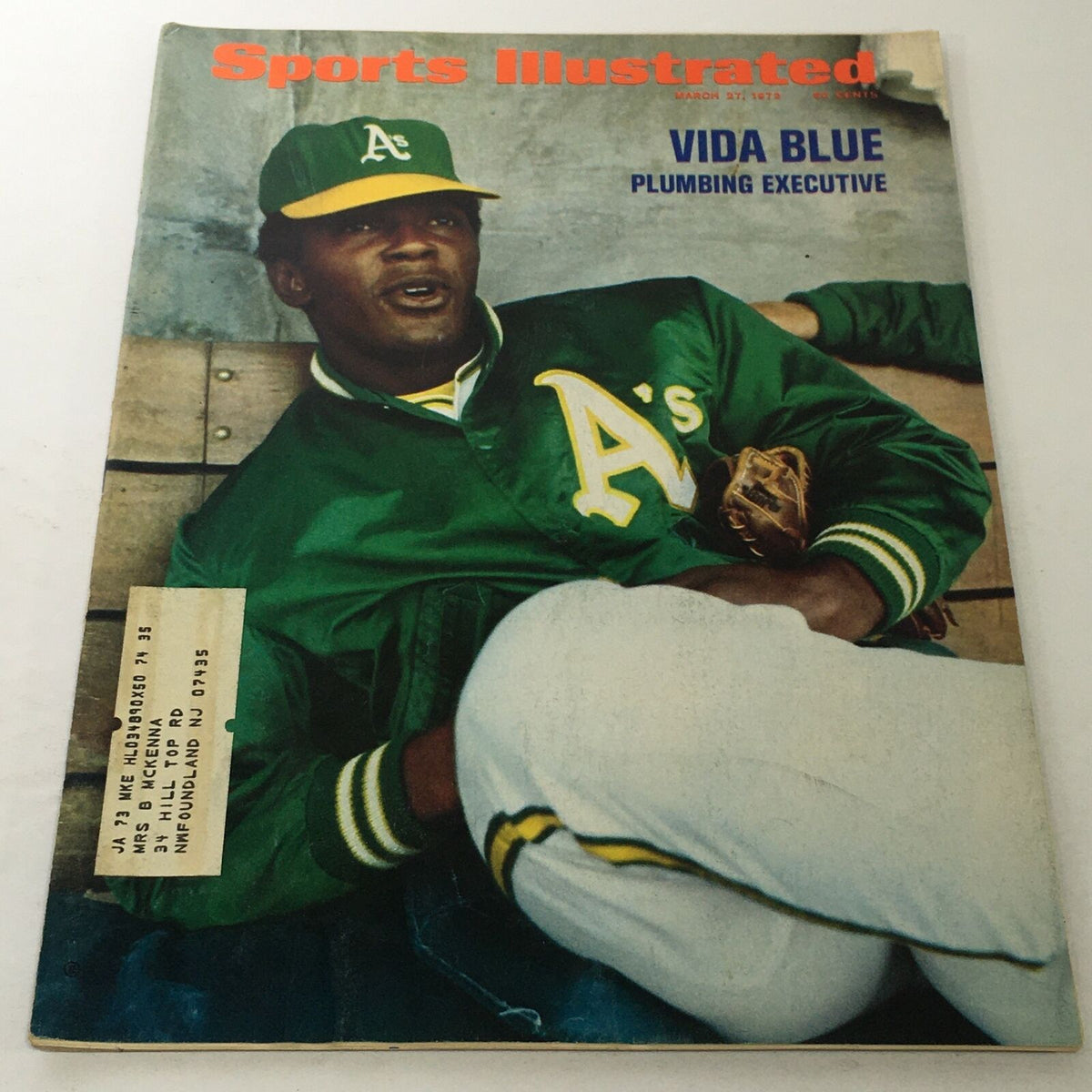 Sports Illustrated cover from March 27, 1972 featuring Vida Blue, Plumbing Executive, showcasing a relaxed pose in a green A's jacket.