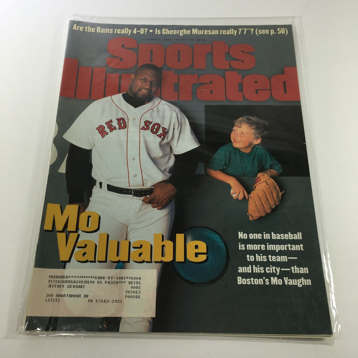 VTG Sports Illustrated cover from October 2, 1995 featuring Boston's Maurice 'Mo' Vaughn, showcasing the headline 'Mo Valuable' with a young boy holding a baseball glove.