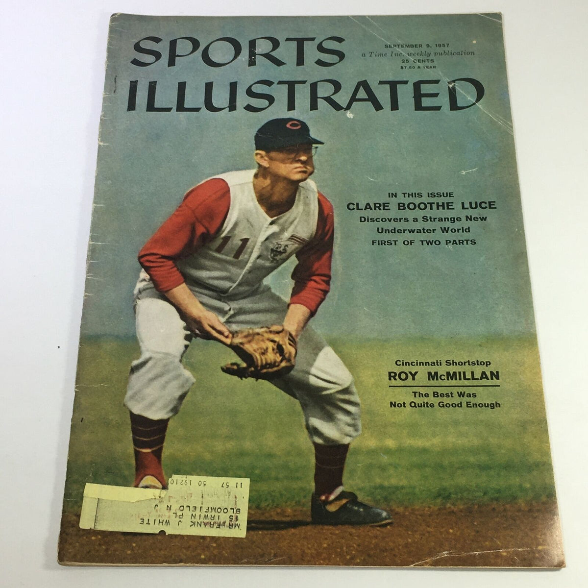 Vintage Sports Illustrated Magazine from September 9, 1957 featuring Cincinnati Shortstop Roy McMillan on the cover. The magazine displays a colorful illustration and includes an address label, embodying a classic piece of sports history.