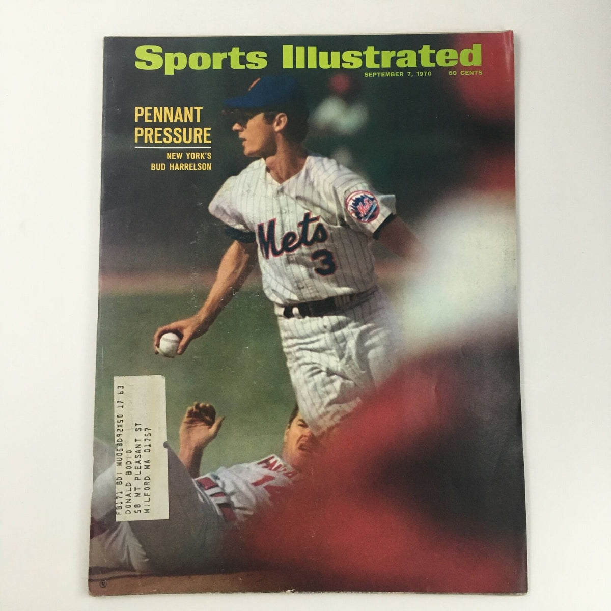 Sports Illustrated Magazine cover, September 7, 1970 featuring New York's Bud Harrelson, showcasing a baseball moment with vibrant colors and historical significance.