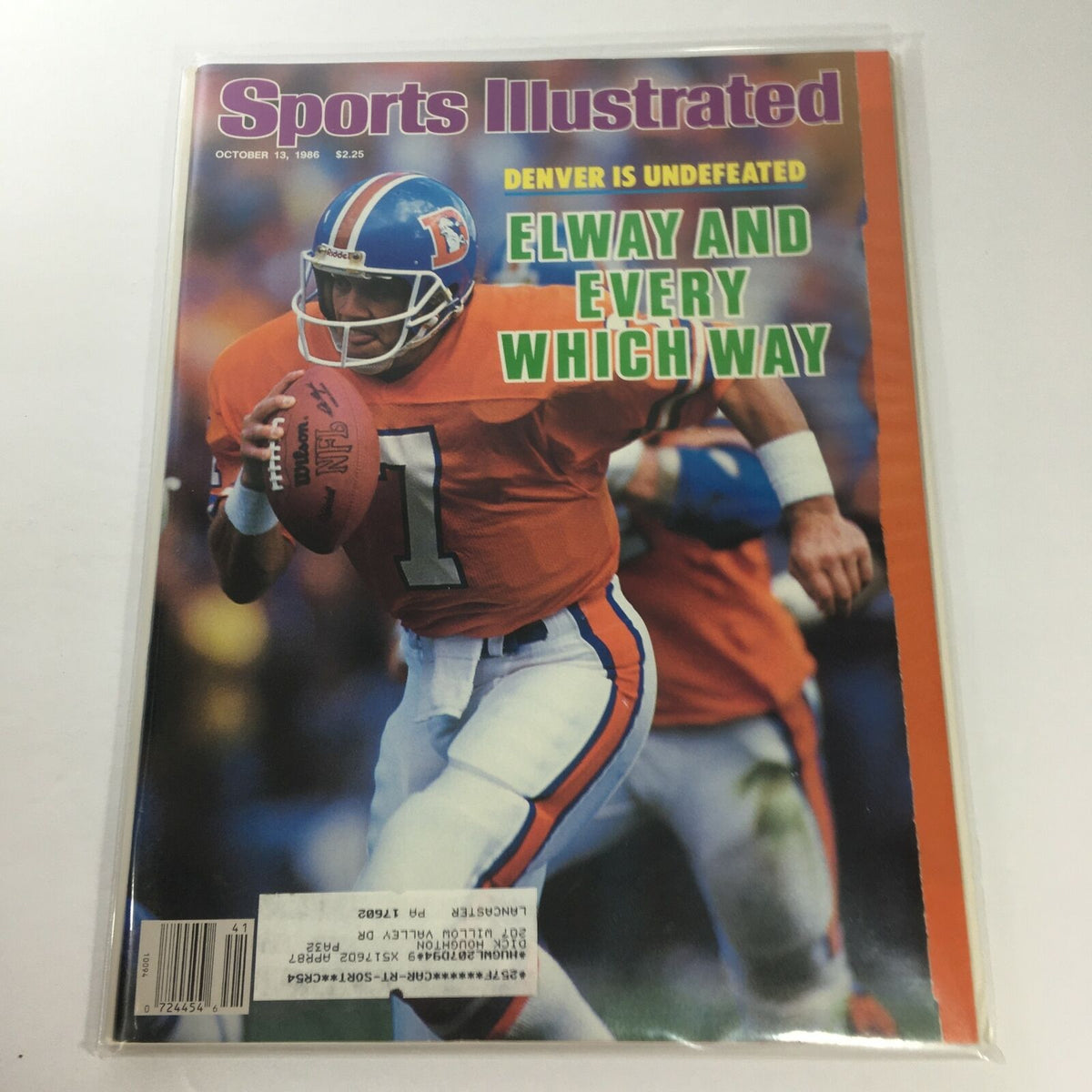 Sports Illustrated cover from October 13, 1986 featuring Denver Undefeated Elway And Every Which Way. The cover prominently displays a football player in an orange uniform, showcasing Denver's winning streak.