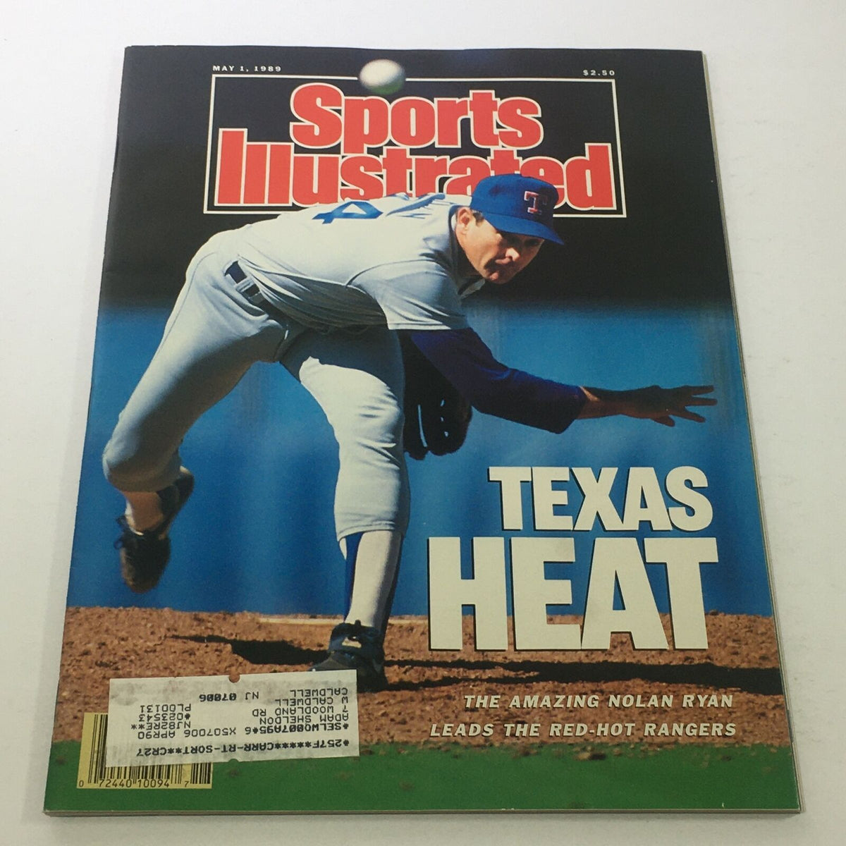 Sports Illustrated cover from May 1, 1989, featuring Major League Pitcher Nolan Ryan with the headline 'Texas Heat'. The magazine showcases Nolan Ryan, highlighting his prominence in baseball and his role with the Texas Rangers.