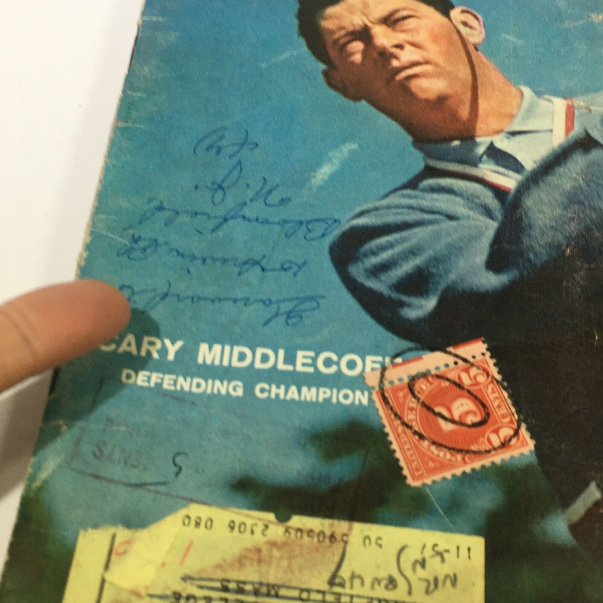 Detailed image of the vintage Sports Illustrated magazine cover from June 10, 1957, showcasing Cary Middlecoff with visible markings and a stamp, highlighting its collectible nature.