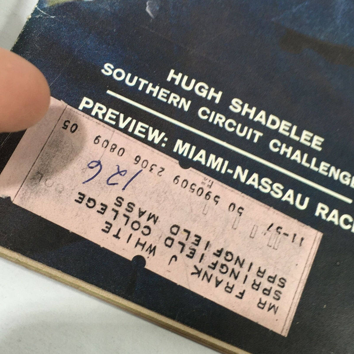 Close-up view of vintage Sports Illustrated magazine with address label, dated February 4, 1957, featuring Hugh Shadelee and preview for Miami-Nassau Race.