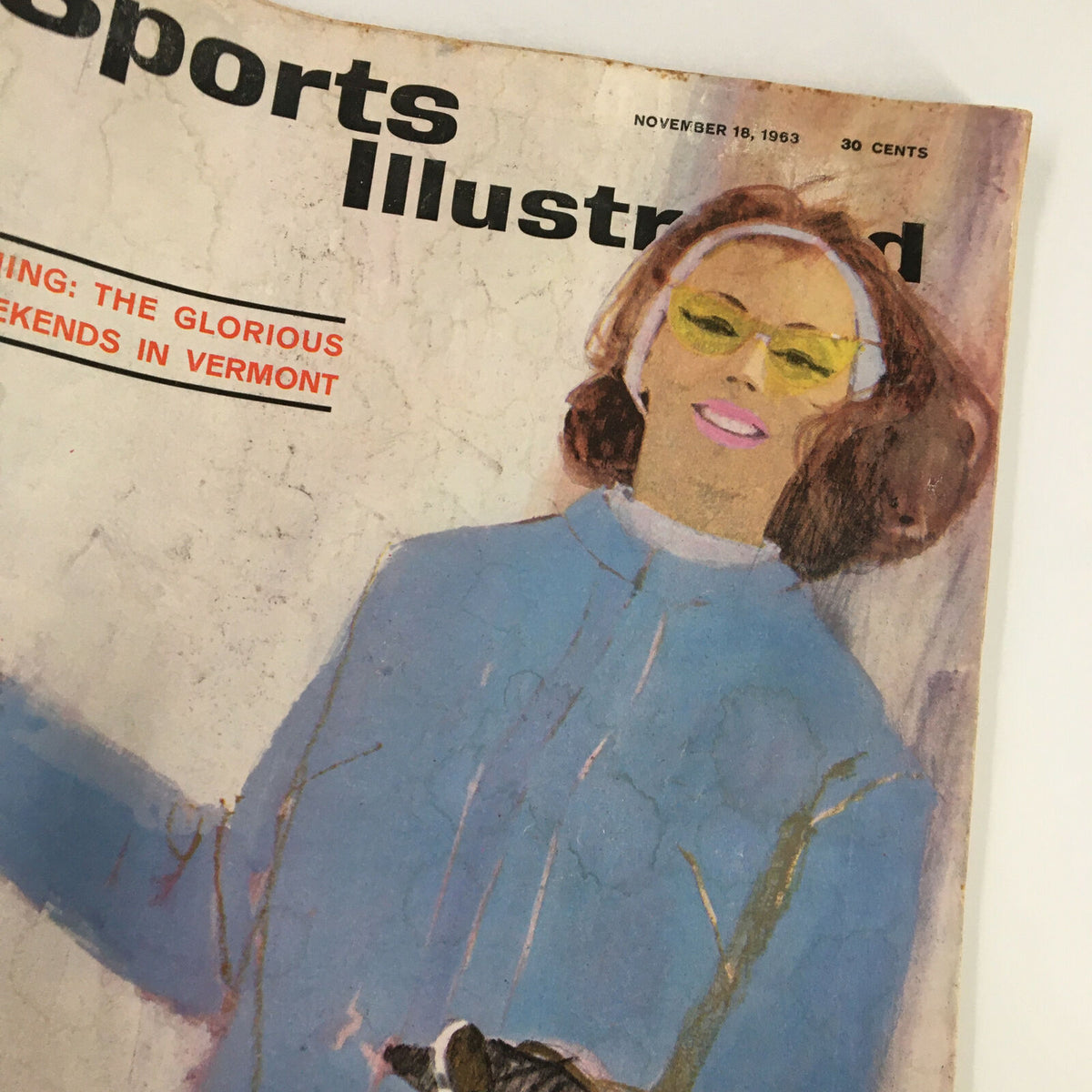Close-up view of Vintage Sports Illustrated Magazine Cover with Cindy Hollingsworth, dated November 18, 1963, highlighting skiing in Vermont.