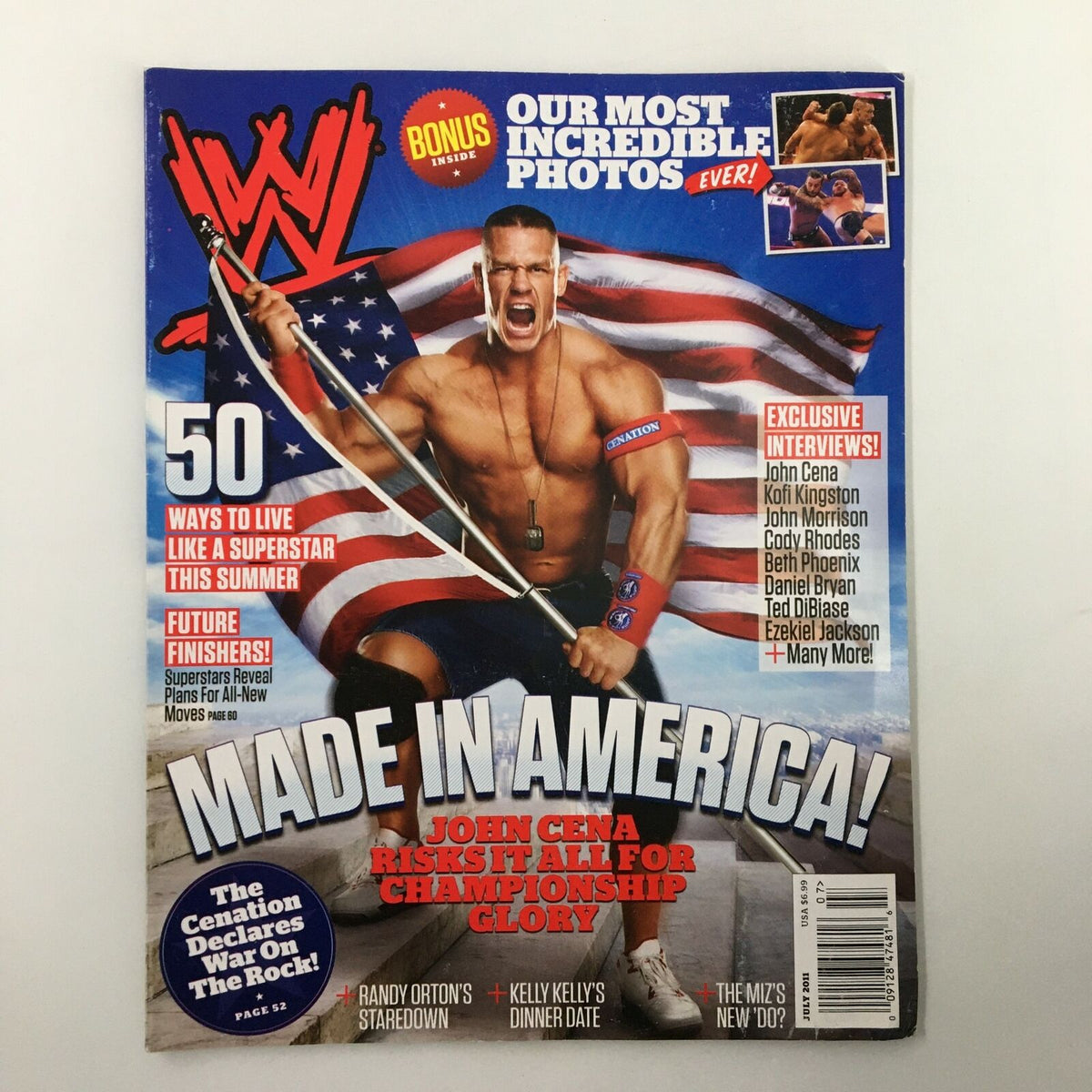 WWE Magazine July 2011 cover featuring John Cena posing with the American flag, celebrating his championship aspirations. This vintage magazine highlights WWE superstars John Cena, Kofi Kingston, and John Morrison, making it a must-have collectible for wrestling fans.