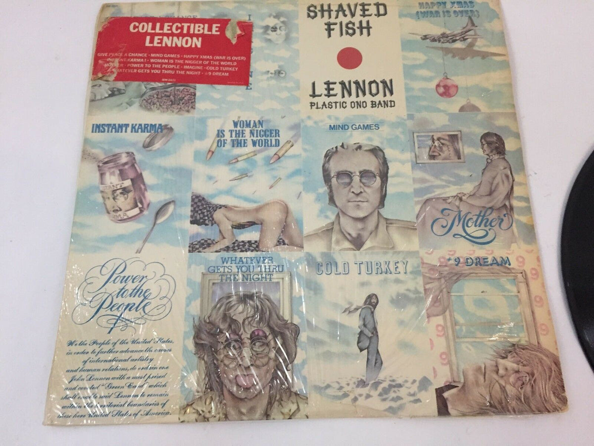 Close-up of the album cover for JOHN LENNON--SHAVED FISH--APPLE--SW-3421 showcasing the cover art with featured songs and a collectible sticker.