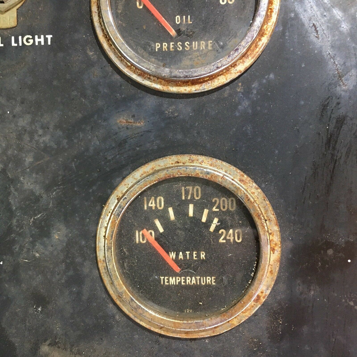 Detailed image of a gauge indicating water temperature, part of the Temperature Water, Oil, Amps, Meter, Gauge Triple Auto Panel. The gauge displays a range from 140 to 240 degrees, highlighting its role in temperature regulation.