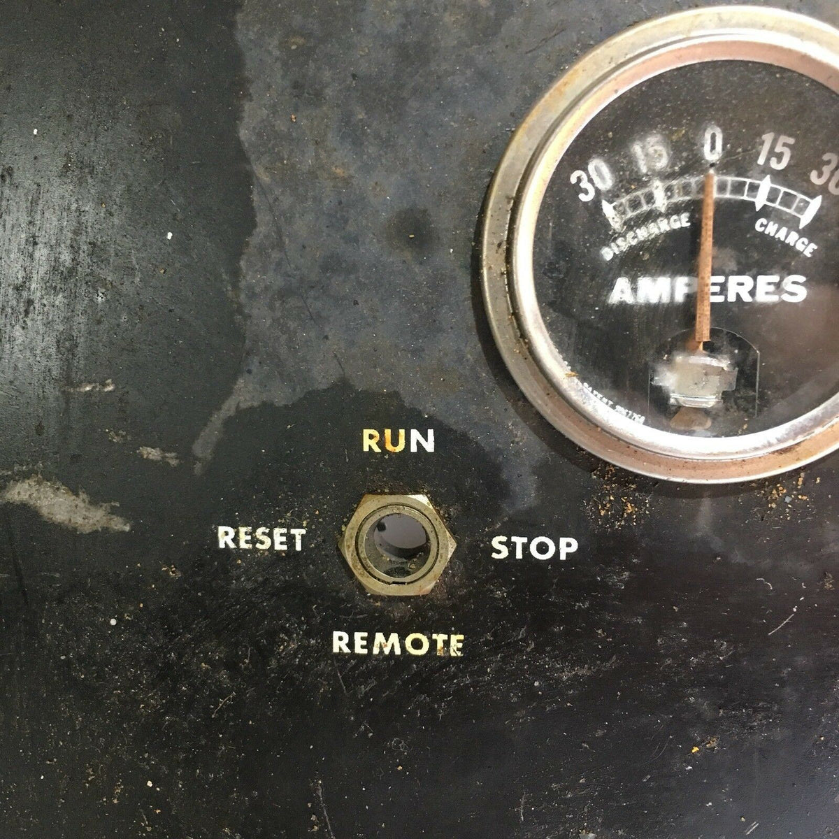 Temperature Water, Oil, Amps, Meter, Gauge Triple Auto Panel displaying controls labeled 'RUN', 'RESET', and 'STOP' along with the ammeter gauge.
