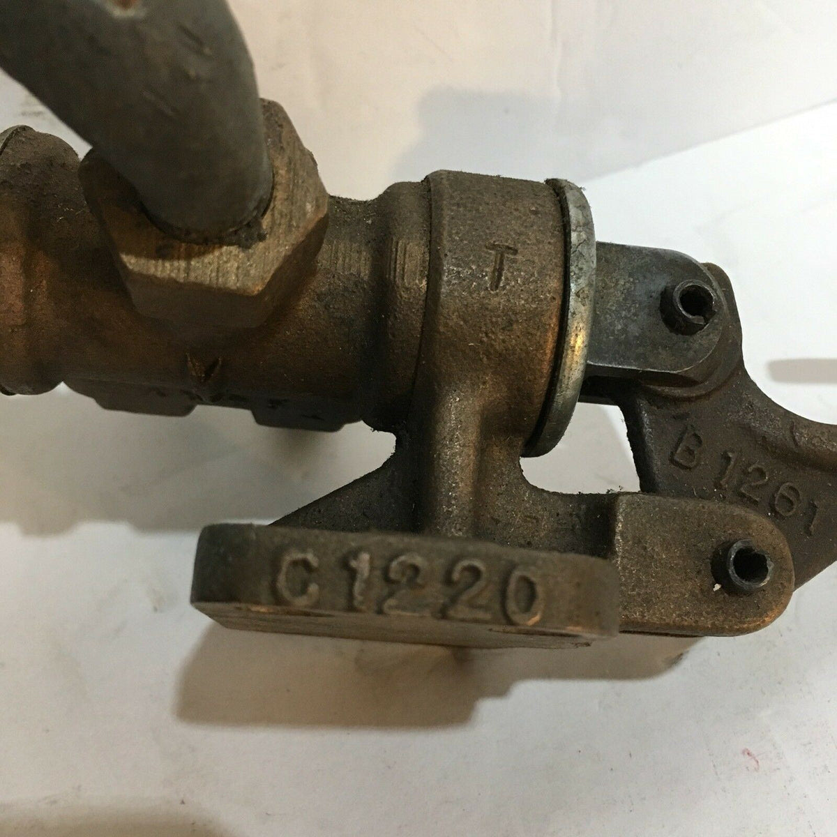 Side view of the NEW BELLOWS VALVAIR MANUAL VALVE 15-24-50A showcasing the engraved code C1220 on the valve component.