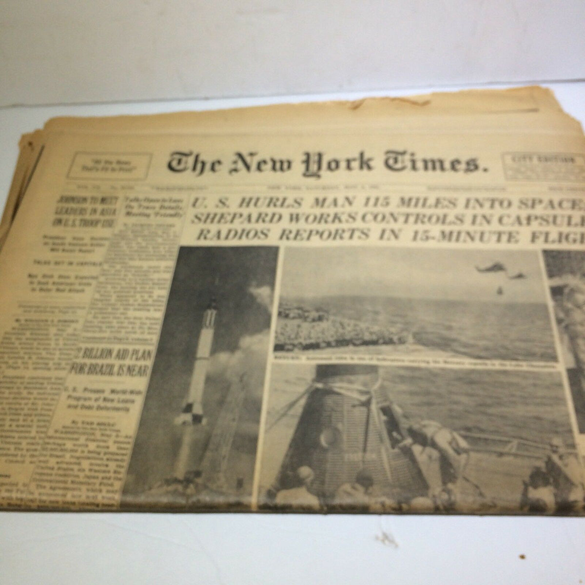 Vintage May 6, 1961 New York Times newspaper featuring an article on US space flight advancements, including a large image and important headlines.