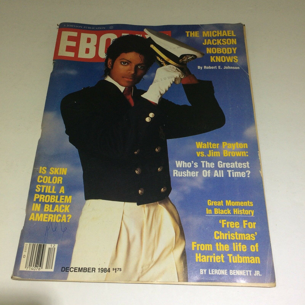 Cover of December 1984 Ebony Magazine featuring 'The Michael Jackson Nobody Knows' with Michael Jackson in a military-inspired outfit, showcasing his iconic style and charisma.