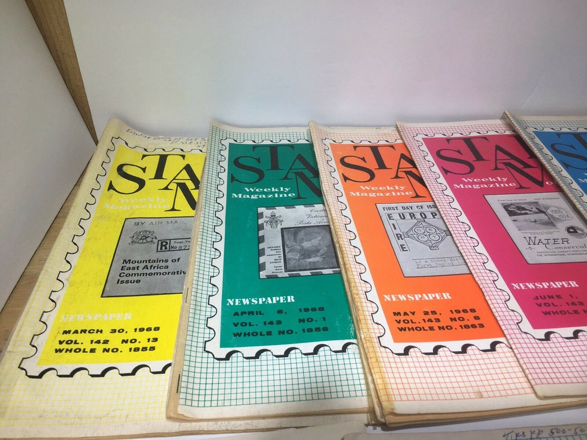 Close-up of Vintage HTF Stamps Weekly Magazines from 1968 showcasing colorful covers and detailed issue information.