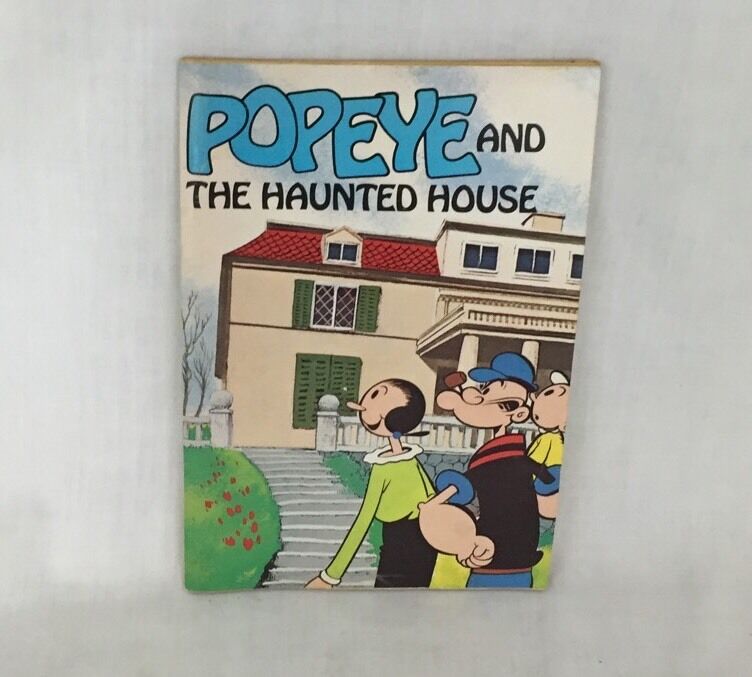 Cover of the VTG 1980 'Popeye and the Haunted House' paperback book showcasing Popeye and characters in front of a haunted house.