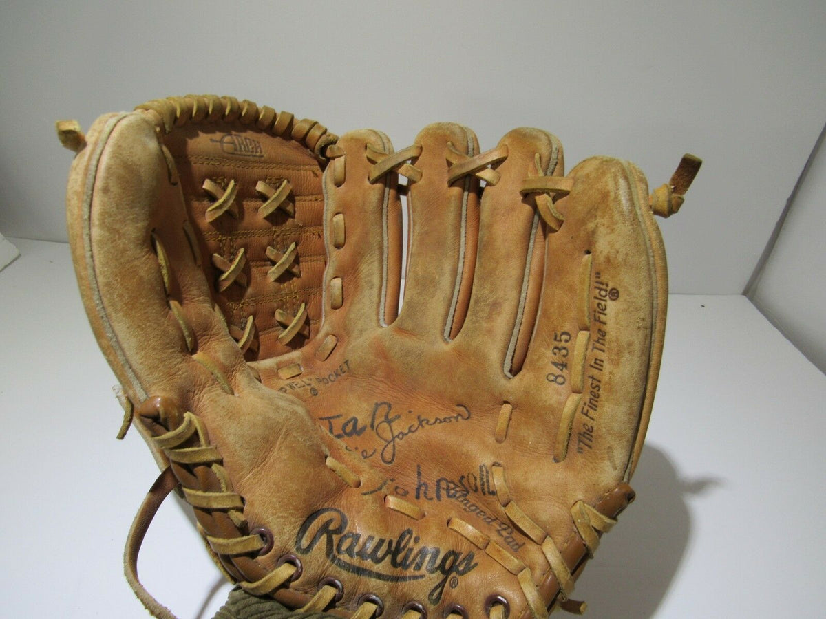 Vintage Rawlings Reggie Jackson Baseball Glove 8435 Ball Mitt showing deep well pocket and inside markings, featuring the name Ian Johnson.