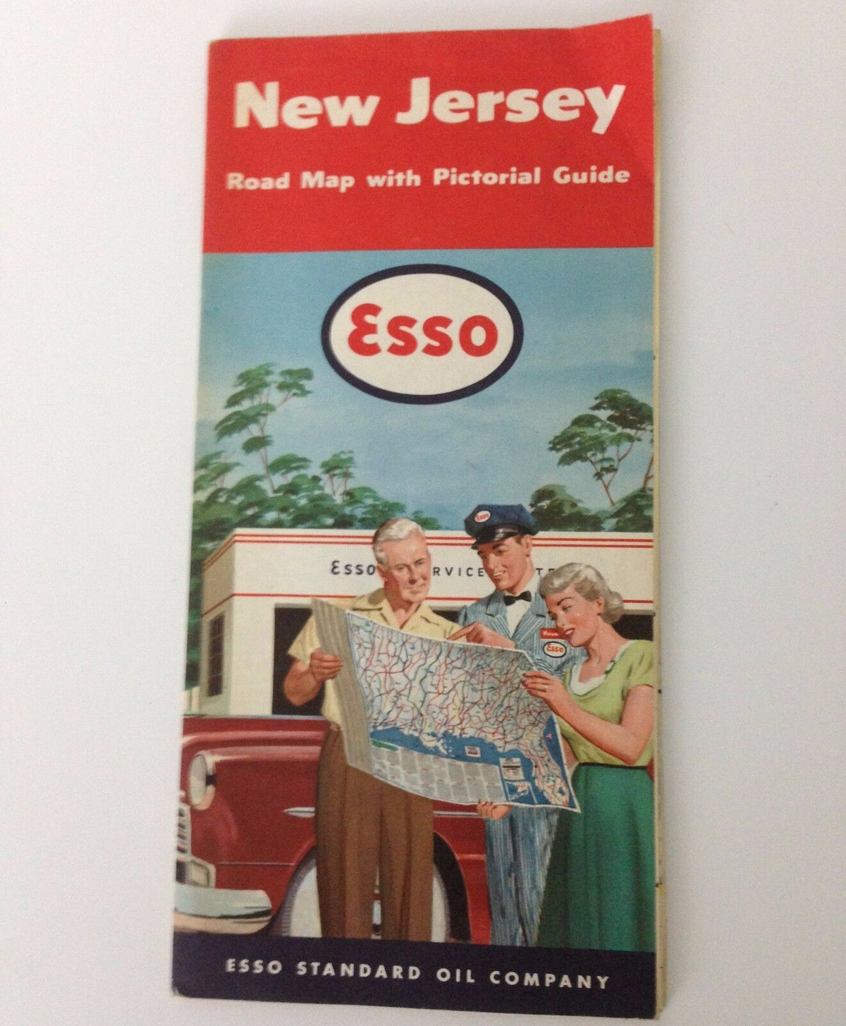 1951 New Jersey Road Map from Esso Booklet Pamphlet featuring a colorful cover with three individuals examining a map beside an Esso gas station.