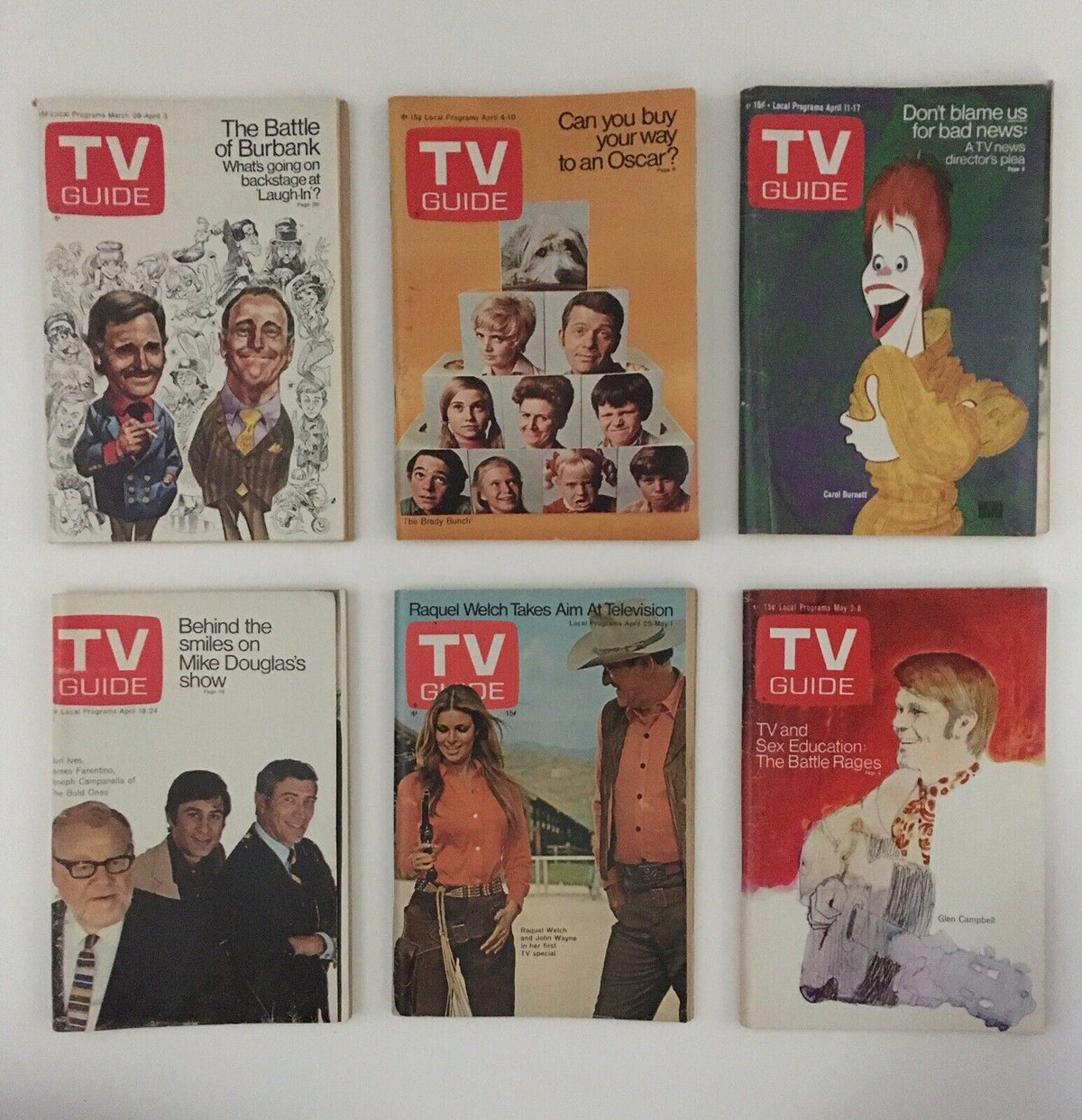 Collection of TV Guide magazines from the Complete Year Of TV Guide Magazines 1970 featuring covers of classic shows like The Battle of Burbank, The Brady Bunch, and Carol Burnett.