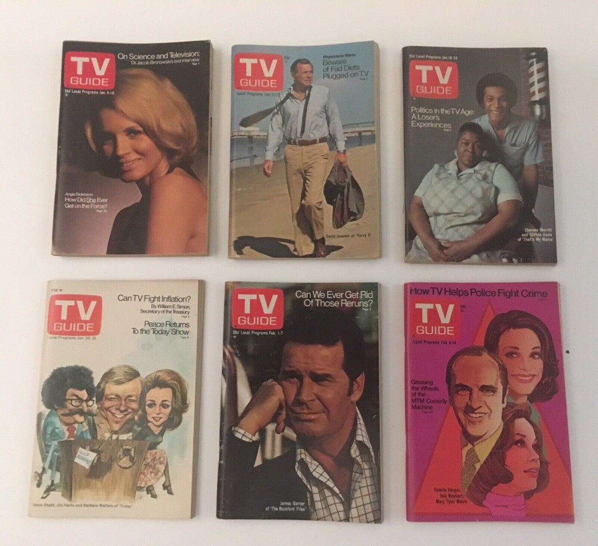 Complete Year of TV Guide Magazines 1975: An assortment of vintage TV Guide covers featuring notable themes and celebrities from the 1975 television scene, showcasing iconic images.