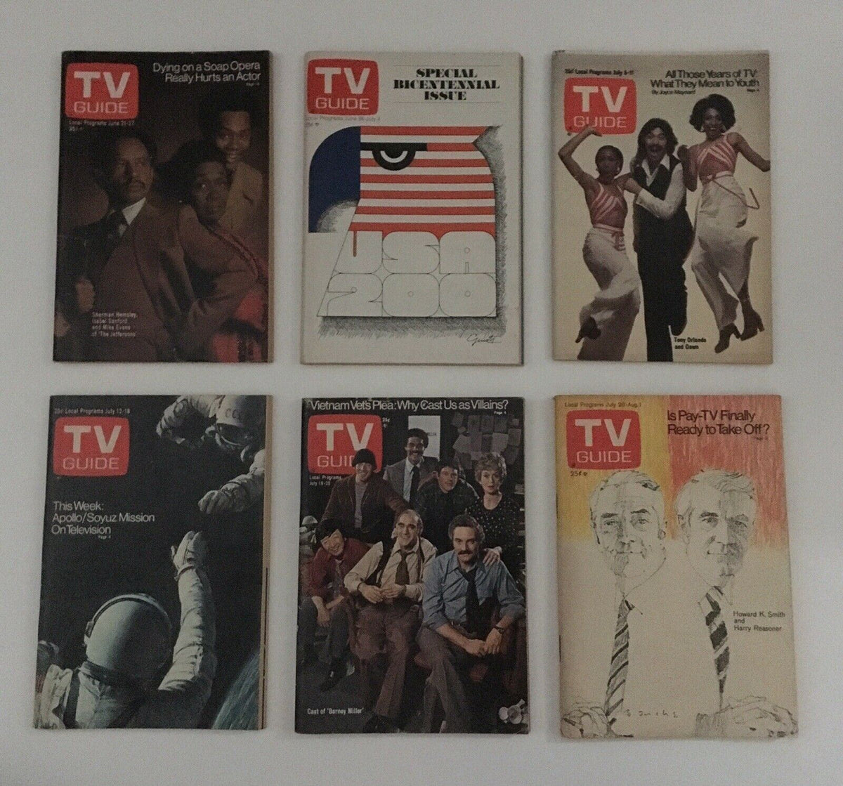 Complete Year of TV Guide Magazines 1975: Display of vintage covers from TV Guide illustrating features and shows that defined the television landscape in 1975.