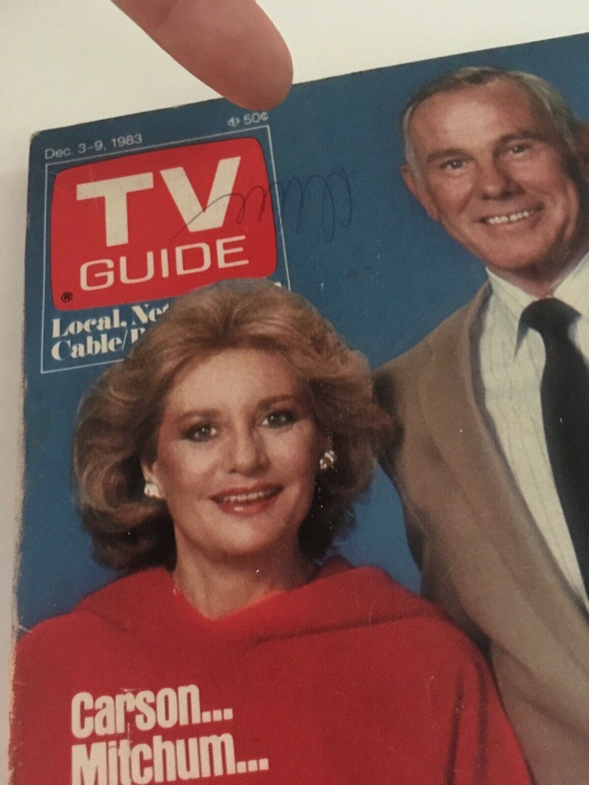 Close-up of a TV Guide Magazine cover dated December 3-9, 1983, featuring notable television personalities with a visible pen mark, part of the complete year collection.