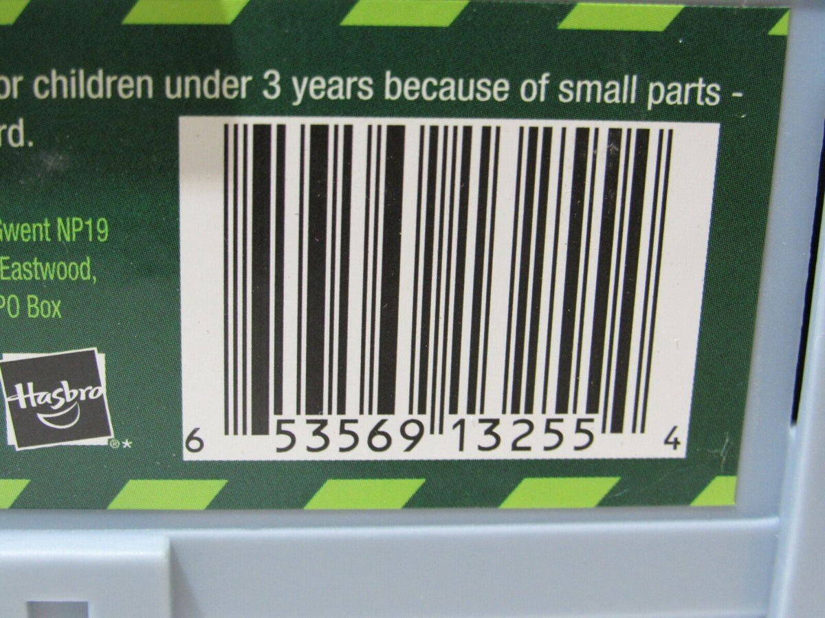 Close-up of the barcode on the G.I. Joe Sigma 6 Snake Eyes Ninja Armor 8 Inch Commando packaging with safety and product details.