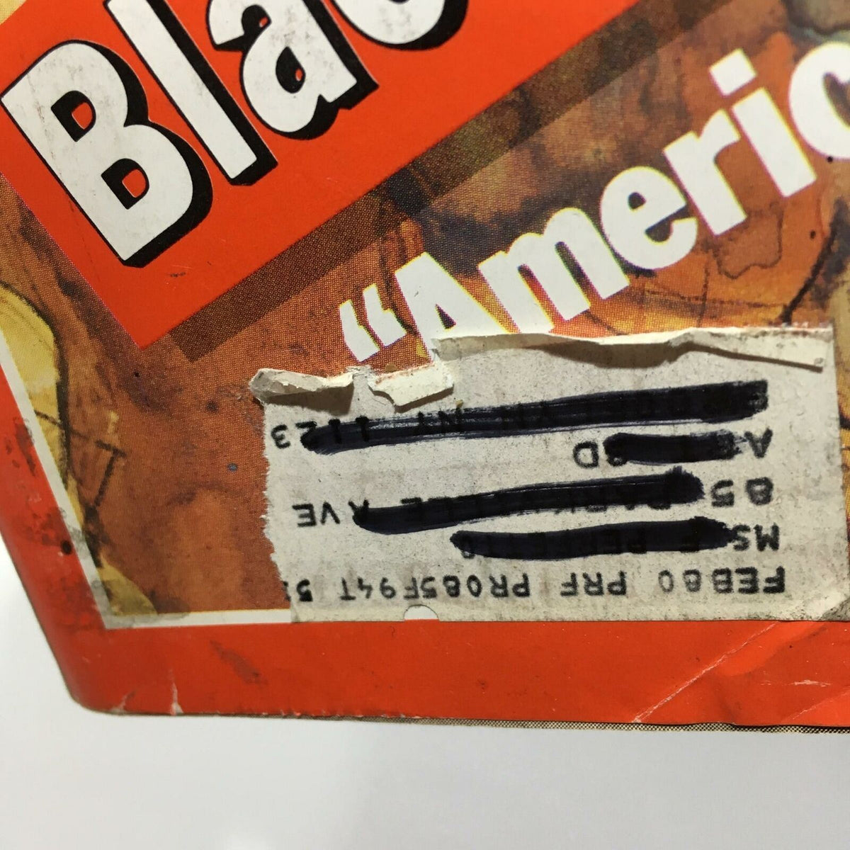 Close-up view of the black label on the cover of Time Magazine dated November 19, 1979, titled 'Blackmailing the U.S: Ayatullah Khomeini', showcasing minor wear and historical significance.