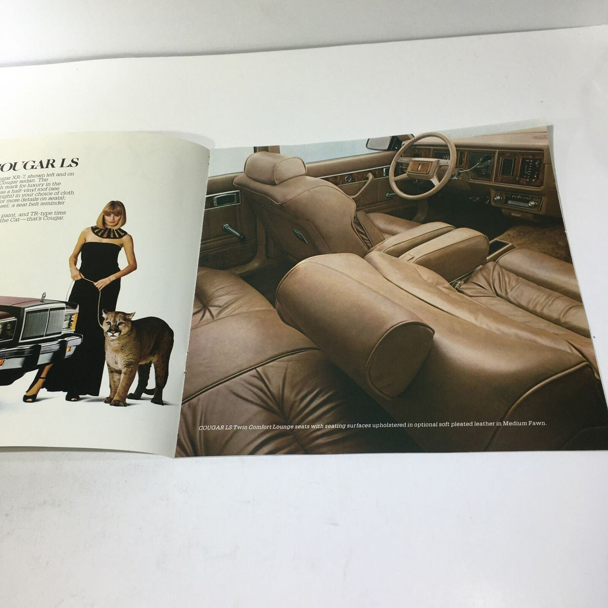 Interior view of the 1981 Lincoln-Mercury Cougars XR-7 Inspired Sedan showing luxurious leather seating in beige color, featured in the car sale brochure.