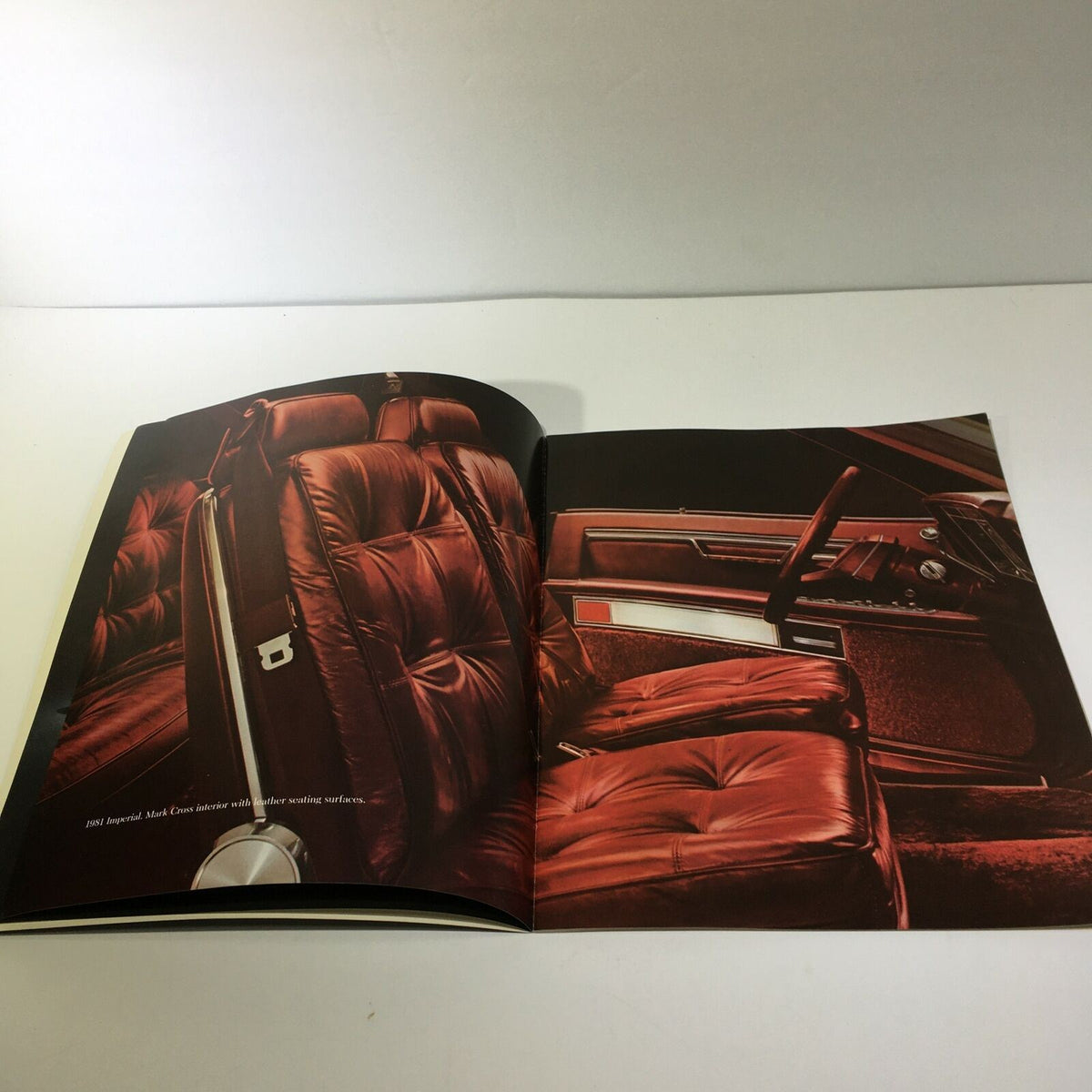 Interior of the 1981 Imperial in Sterling Silver Crystal Coat - Imperial Car Sale Brochure, highlighting the luxurious red leather seating and detailed craftsmanship.