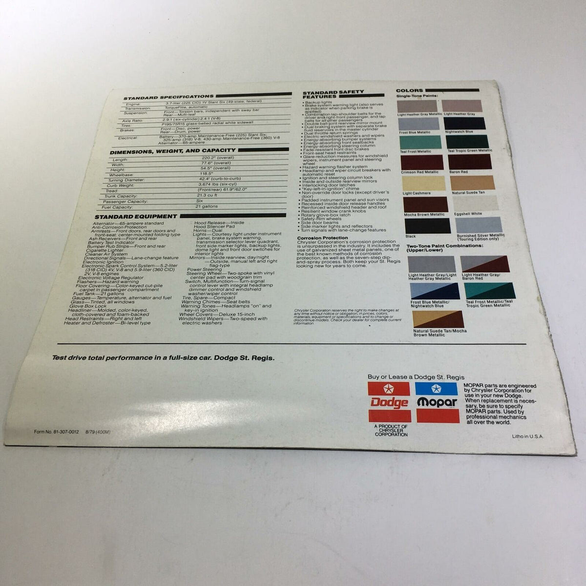 1980 Dodge St. Regis 225 Slant Six Standard V-8 Engine Options Car Brochure featuring standard specifications and equipment listed on the back.
