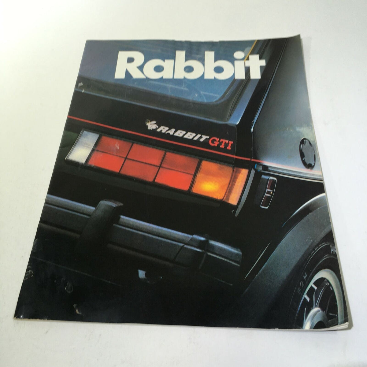 Cover of the 1983 Volkswagen Rabbit GTI 2-Door Sedan Car Sale Brochure featuring the iconic Rabbit GTI logo.