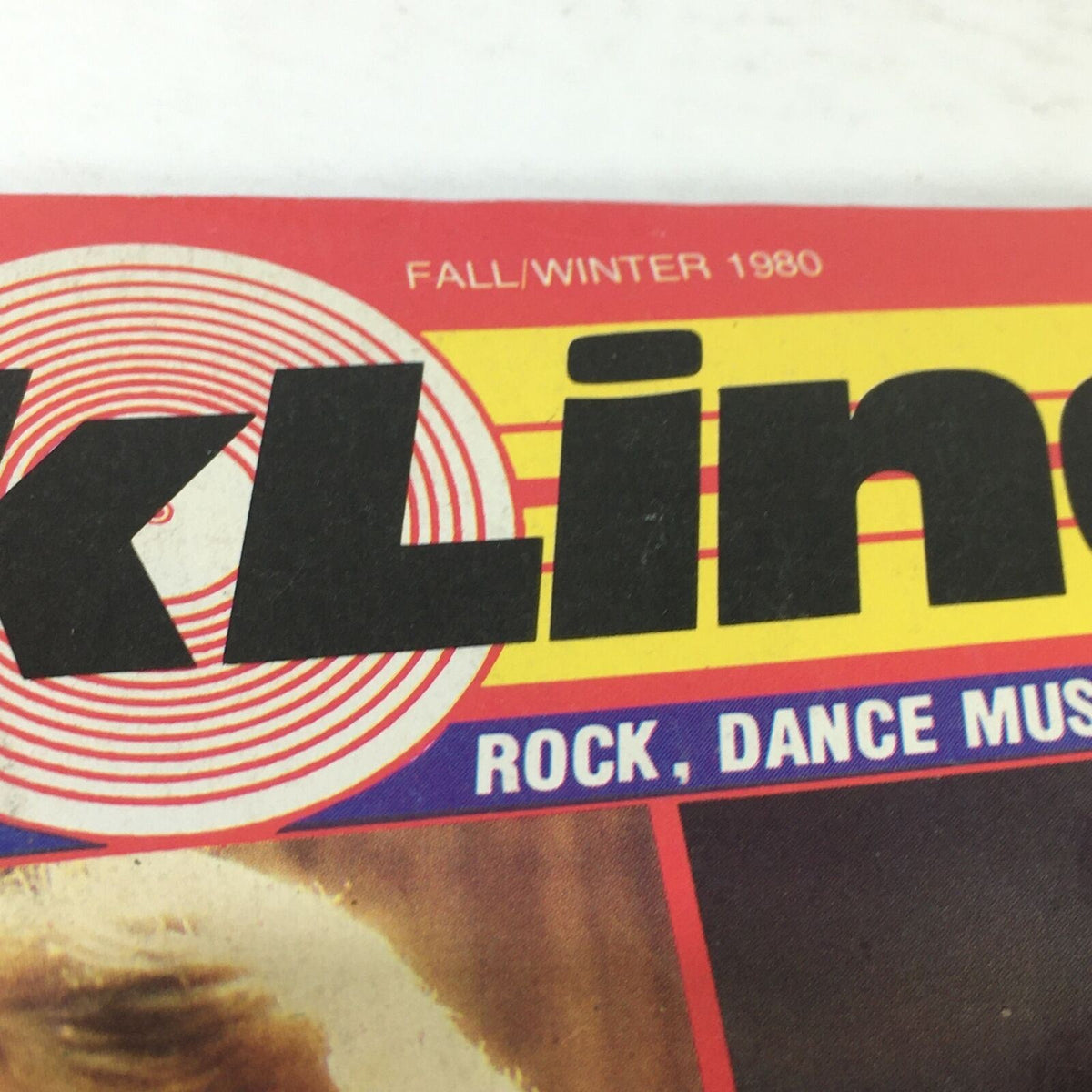 Close-up of the Rock Line Magazine title from the Fall/Winter 1980 issue, showcasing the vibrant graphic design and text indicating rock, dance music, and new wave.