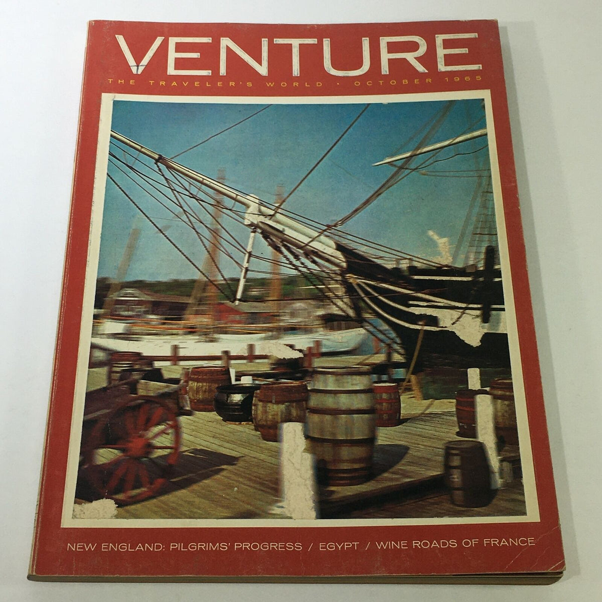 Cover of VTG Venture Magazine Book from October 1965 featuring a vibrant image of a ship and barrels, highlighting New England, Egypt, and France.